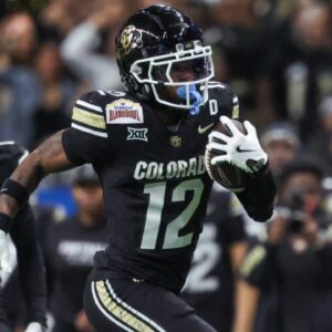 Dec 28, 2024; San Antonio, TX, USA; Colorado Buffaloes wide receiver Travis Hunter (12) runs with the ball during the second quarter against the Brigham Young Cougars at Alamodome.