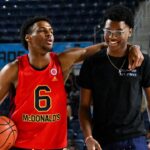 McDonald's All American West guard Bronny James (6) and Bryce Maximus James (right) walk on the court during the Powerade Jam Fest at Delmar Athletic Complex.