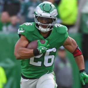 Dec 29, 2024; Philadelphia, Pennsylvania, USA; Philadelphia Eagles running back Saquon Barkley (26) runs with the football during the second quarter against the Dallas Cowboys at Lincoln Financial Field.