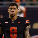 Miami Hurricanes tight end Elijah Arroyo (8) looks on from the field before the game against the Florida State Seminoles at Hard Rock Stadium.