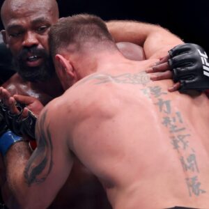 Jon Jones (red gloves) fights Stipe Miocic (blue gloves) in the heavyweight bout during UFC 309 at Madison Square Garden.
