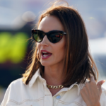 Sep 5, 2021; Darlington, South Carolina, USA; Samantha Busch walks down pit road prior to the Cook Out Southern 500 at Darlington Raceway. Mandatory Credit: Jasen Vinlove-Imagn Images