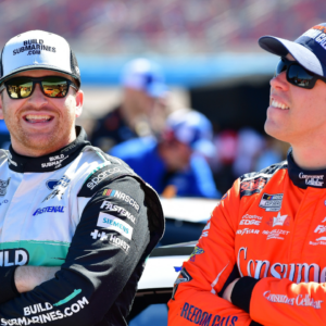 NASCAR Cup Series driver Chris Buescher (17) speaks with driver Brad Keselowski (6) during Cup Series qualifying at Phoenix Raceway.