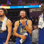 Golden State Warriors guard Klay Thompson (11), guard Stephen Curry (30) and forward Draymond Green (23) after the game against the Los Angeles Clippers at Chase Center.