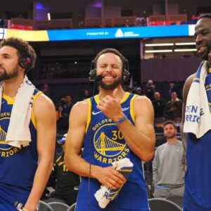 Golden State Warriors guard Klay Thompson (11), guard Stephen Curry (30) and forward Draymond Green (23) after the game against the Los Angeles Clippers at Chase Center.
