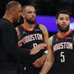 Houston Rockets head coach Ime Udoka (left) talks with forward Dillon Brooks (9) and guard Fred VanVleet (5) during the fourth quarter against the Memphis Grizzlies at FedExForum.