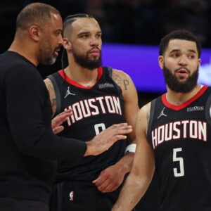 Houston Rockets head coach Ime Udoka (left) talks with forward Dillon Brooks (9) and guard Fred VanVleet (5) during the fourth quarter against the Memphis Grizzlies at FedExForum.
