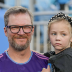 Coronation guest Dale Earnhardt Jr. with his daughter Isla Rose during pregame warm ups between the Charlotte FC and the Colorado Rapids at Bank of America Stadium.