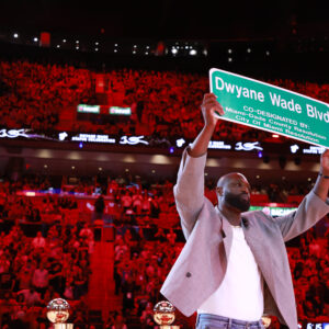 Former Miami Heat guard Dwyane Wade is honored with 'Dwayne Wade Blvd' at halftime during a game against the Detroit Pistons at Kaseya Center.