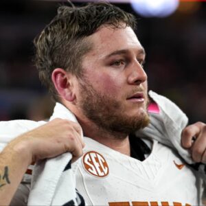 Texas Longhorns quarterback Quinn Ewers (3) looks into the crowd after the 28-14 loss to Ohio State in the College Football Playoff semifinal game in the Cotton Bowl at AT&T Stadium on Friday, Jan. 10, 2024 in Arlington, Texas.