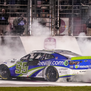 NASCAR Cup Series driver Daniel Suarez (99) celebrates after winning the Ambetter Health 400 at Atlanta Motor Speedway.