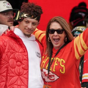 Kansas City Chiefs quarterback Patrick Mahomes (15) celebrates with his mother Randi Martin during the Kansas City Chiefs Super Bowl parade.