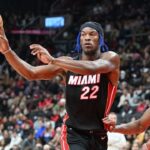 Miami Heat forward Jimmy Butler (22) passes the ball against the Toronto Raptors in the first half at Scotiabank Arena.