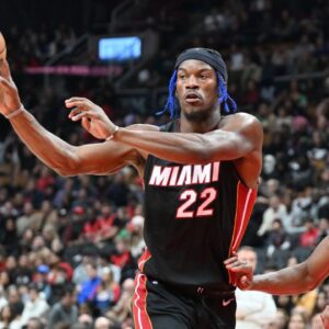 Miami Heat forward Jimmy Butler (22) passes the ball against the Toronto Raptors in the first half at Scotiabank Arena.