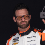 NASCAR Cup Series driver Corey LaJoie (7) waves at the crowd before the start of the Toyota / Save Mart 350 at Sonoma Raceway.