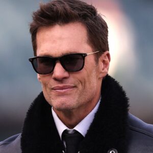 Announcer Tom Brady looks on before an NFC wild card game between the Philadelphia Eagles and the Green Bay Packers at Lincoln Financial Field.