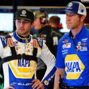 NASCAR Cup Series driver Chase Elliott (9) talks with his crew chief Alan Gustafson as they work to ready his car before practice for the Daytona 500 at Daytona International Speedway.