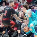 Chicago Bulls guard Lonzo Ball (2) defends Charlotte Hornets guard LaMelo Ball (1) during the first quarter at United Center