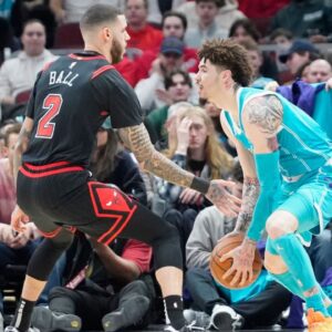 Chicago Bulls guard Lonzo Ball (2) defends Charlotte Hornets guard LaMelo Ball (1) during the first quarter at United Center