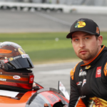 NASCAR Cup Series driver Chase Briscoe (19) prepares to get in the car after a rain delay for the Daytona 500 at Daytona International Speedway.