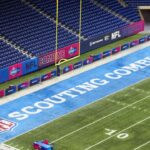 The 2024 NFL Scouting Combine logo in the end zone at Lucas Oil Stadium.
