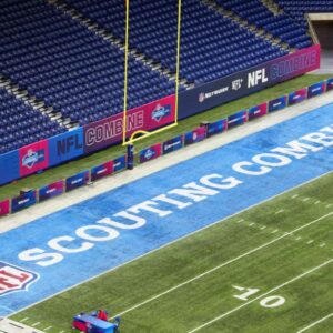 The 2024 NFL Scouting Combine logo in the end zone at Lucas Oil Stadium.