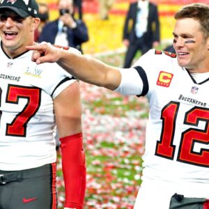 Tampa Bay Buccaneers quarterback Tom Brady (12) and tight end Rob Gronkowski (87) celebrate after beating the Kansas City Chiefs in Super Bowl LV at Raymond James Stadium.
