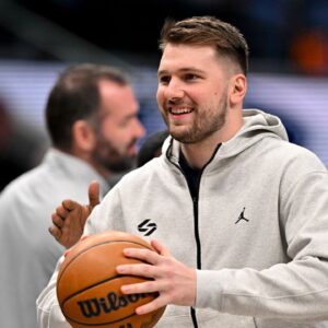 Dallas Mavericks guard Luka Doncic (77) looks on during a stoppage in play during the first half of the game between the Dallas Mavericks and the Minnesota Timberwolves at the American Airlines Center.