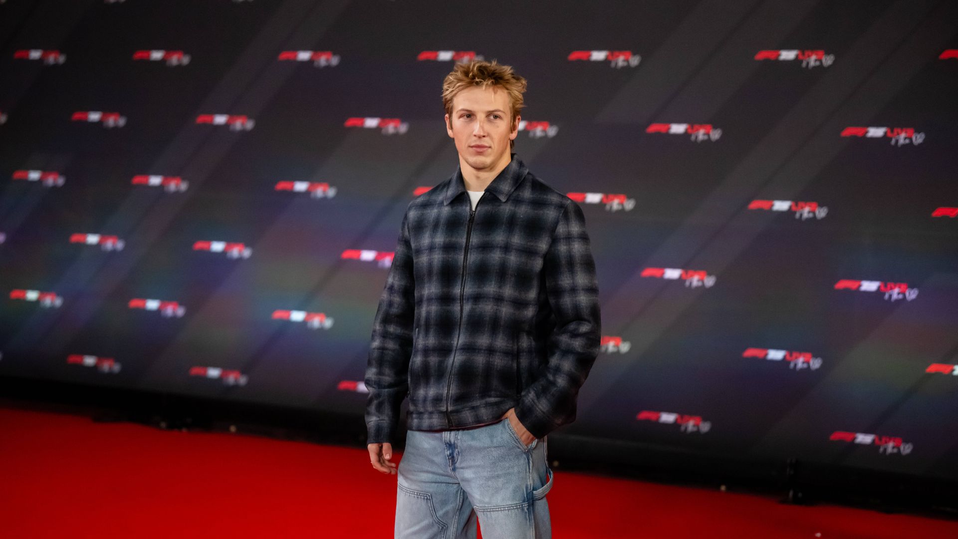 LONDON, UNITED KINGDOM: Liam Lawson arriving on the red carpet at the start of the F175 Live Formula 1 car launch at the O2 arena in London
