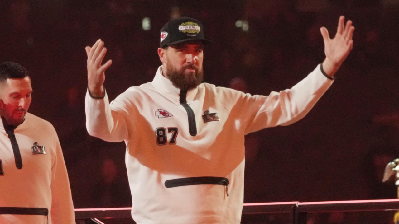 Feb 3, 2025; New Orleans, LA, USA; Kansas City Chiefs tight end Travis Kelce (87) waves to the crowd during Super Bowl LIX Opening Night at Ceasars Superdome.