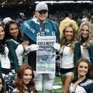 Philadelphia Eagles cornerback Cooper DeJean (M) celebrates with Eagles cheerleaders after Super Bowl LIX against the Kansas City Chiefs at Caesars Superdome.