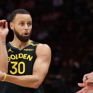Golden State Warriors guard Stephen Curry (30) talks to official Brett Nansel in the first half against the Houston Rockets at Toyota Center.