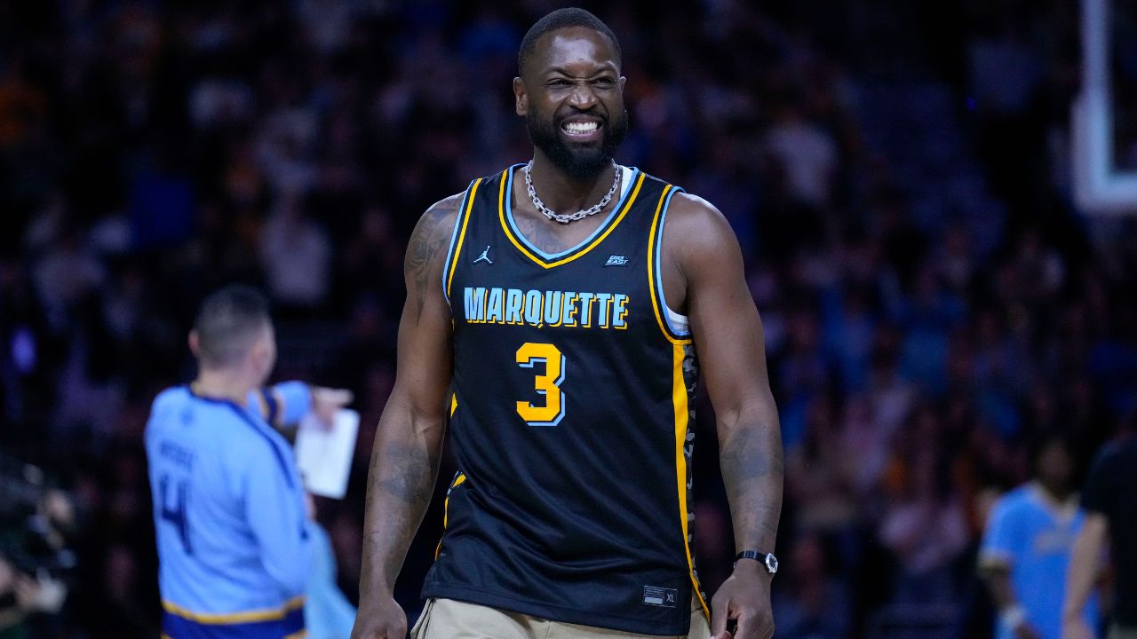 Marquette Golden Eagles player Dwyane Wade smiles timeout during the first half of the game against the Providence Friars at Fiserv Forum.