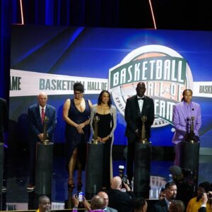 Class of 2024 inductees and their representatives share the stage at the conclusion of the Naismith Memorial Basketball Hall of Fame Enshrinement at Symphony Hall Springfield.