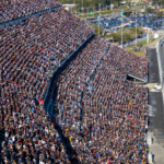 Feb 19, 2024; Daytona Beach, Florida, USA; NASCAR Cup Series driver Joey Logano (22) and Michael McDowell (34) lead the field to the green flag during the Daytona 500 at Daytona International Speedway. Mandatory Credit: Mark J. Rebilas-Imagn Images
