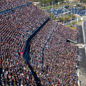 Feb 19, 2024; Daytona Beach, Florida, USA; NASCAR Cup Series driver Joey Logano (22) and Michael McDowell (34) lead the field to the green flag during the Daytona 500 at Daytona International Speedway. Mandatory Credit: Mark J. Rebilas-Imagn Images
