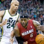 Miami Heat small forward LeBron James (6) dribbles the ball in front of Utah Jazz small forward Richard Jefferson (24) during the first half at EnergySolutions Arena.