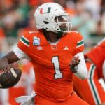 Dec 28, 2024; Orlando, FL, USA; Miami Hurricanes quarterback Cam Ward (1) drops back to pass against the Iowa State Cyclones in the first quarter during the Pop Tarts bowl at Camping World Stadium.