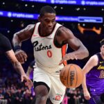 Detroit Pistons center Jalen Duren (0) moves in for the ball ahead of Los Angeles Lakers forward Anthony Davis (3) during the first half at Crypto.com Arena