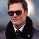 Announcer Tom Brady looks on before an NFC wild card game between the Philadelphia Eagles and the Green Bay Packers at Lincoln Financial Field.