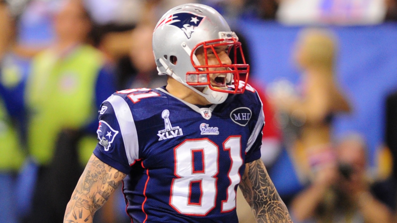 Feb 5, 2012; Indianapolis, IN, USA; New England Patriots tight end Aaron Hernandez celebrates as he scores a touchdown during Super Bowl XLVI against the New York Giants at Lucas Oil Stadium.