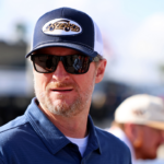 Feb 12, 2025; Daytona Beach, Florida, USA; NASCAR team owner Dale Earnhardt Jr. looks on during practice for the Daytona 500 at Daytona International Speedway. Mandatory Credit: Peter Casey-Imagn Images