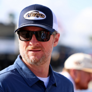 Feb 12, 2025; Daytona Beach, Florida, USA; NASCAR team owner Dale Earnhardt Jr. looks on during practice for the Daytona 500 at Daytona International Speedway. Mandatory Credit: Peter Casey-Imagn Images