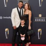 Saquon Barkley with Anna Congdon and daughter Jada Clare Barkley on the red carpet before the NFL Honors show at Resorts World Theatre.