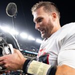 Atlanta Falcons quarterback Kirk Cousins (18) removes his helmet after a victory Philadelphia Eagles at Lincoln Financial Field.
