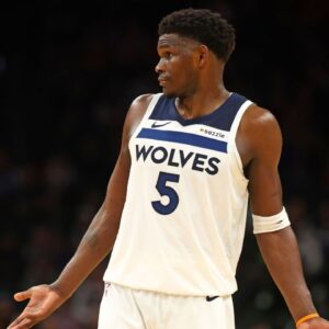 Minnesota Timberwolves guard Anthony Edwards (5) reacts against the Phoenix Suns in the second half at Footprint Center.