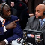 TNT broadcaster Shaquille O'Neal (left) and Charles Barkley talk during the 2013 NBA All-Star slam dunk contest at the Toyota Center.