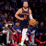 Feb 26, 2025; New York, New York, USA; New York Knicks guard Jalen Brunson (11) brings the ball up court against the Philadelphia 76ers during the first quarter at Madison Square Garden. Mandatory Credit: Brad Penner-Imagn Images