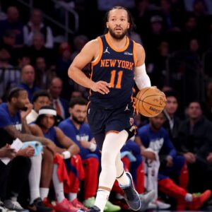 Feb 26, 2025; New York, New York, USA; New York Knicks guard Jalen Brunson (11) brings the ball up court against the Philadelphia 76ers during the first quarter at Madison Square Garden. Mandatory Credit: Brad Penner-Imagn Images