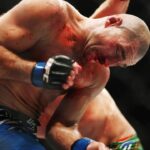 UFC 312 SYDNEY, Sean Strickland of United States ducks from a punch from Dricus Du Plessis of South Africa in his middleweight title bout during the UFC 312 event at Qudos Bank Arena in Sydney, Sunday, February 9, 2025.